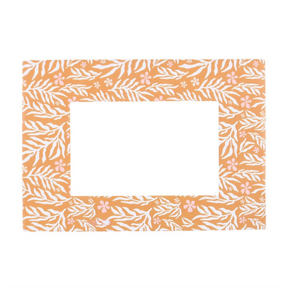 Rectangular envelope with a floral pattern on an orange background