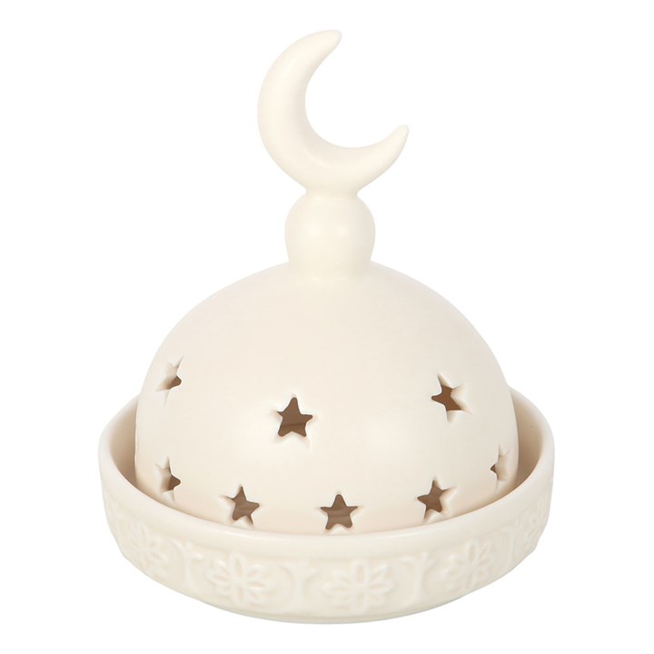 Decorative ceramic item with moon and star design on a white background