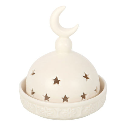 Decorative ceramic item with moon and star design on a white background