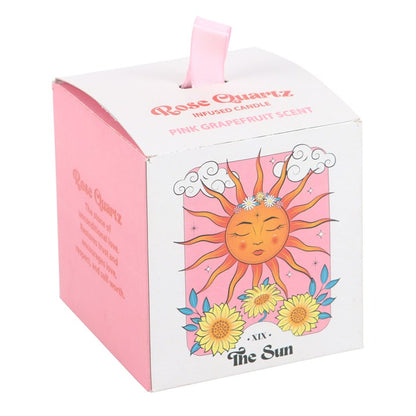Candle packaging with sun design and text on a white background