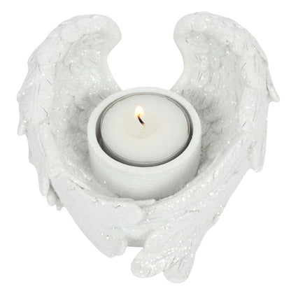 Angel wing shaped white tealight candle holder