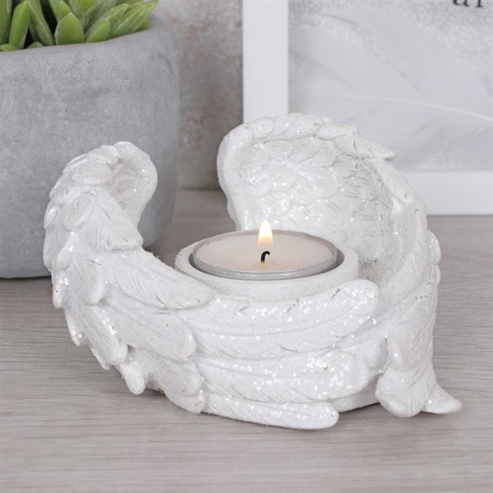 Angel wing shaped white tealight candle holder