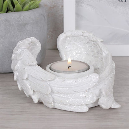 Angel wing shaped white tealight candle holder