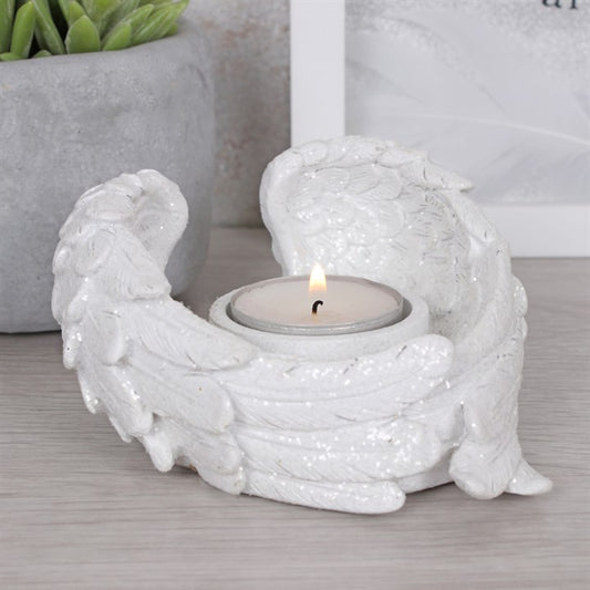 Angel wing shaped white tealight candle holder