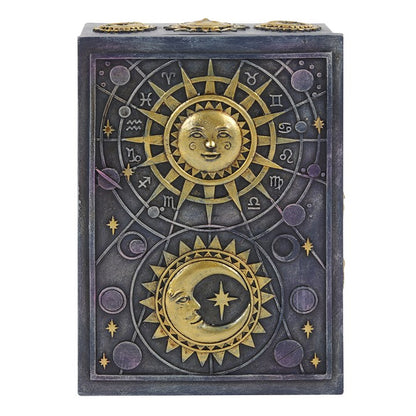 Decorative box with sun and moon design on a white background