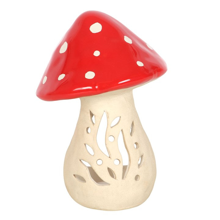 Mushroom-shaped decorative item with red cap and beige stem on a white background