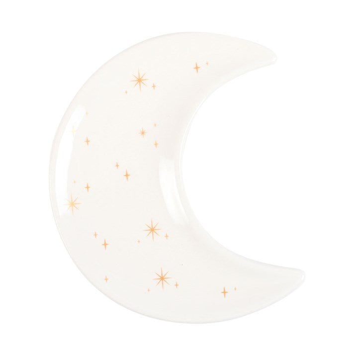 Crescent moon-shaped plate with star patterns on a white background