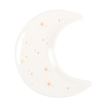 Crescent moon-shaped plate with star patterns on a white background