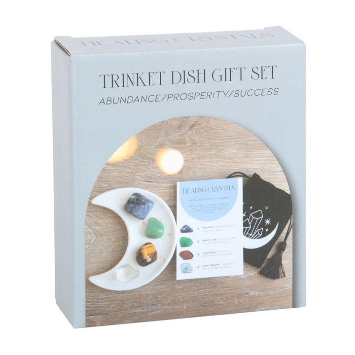 Trinket dish gift set packaging with wooden trinket dish, crystals, and information card on a white background.