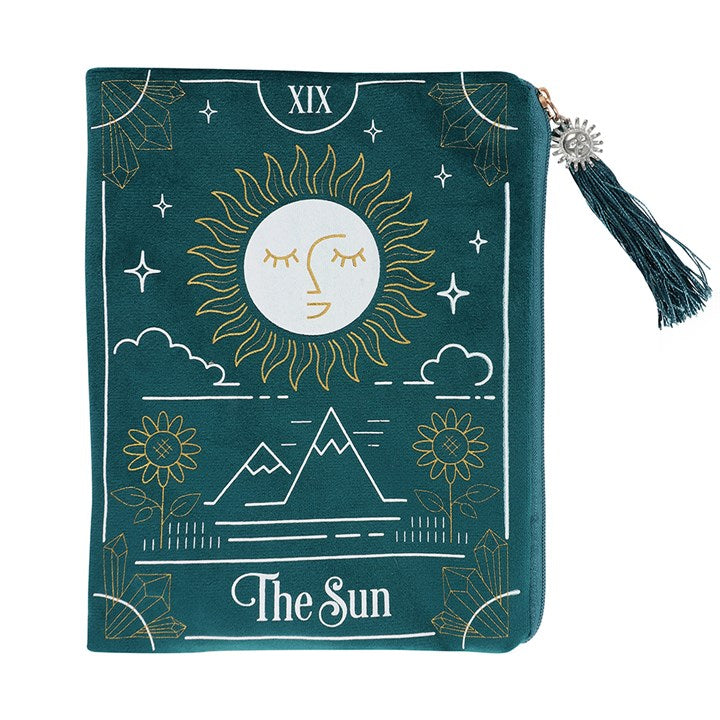 Green pouch with sun and moon design and 'The Sun' text on a white background