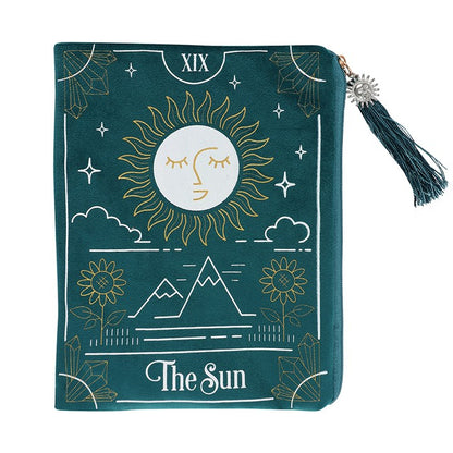 Green pouch with sun and moon design and 'The Sun' text on a white background