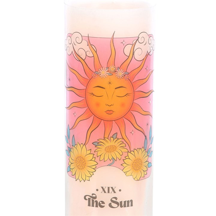 Candle with a sun design and 'The Sun' text on a white background