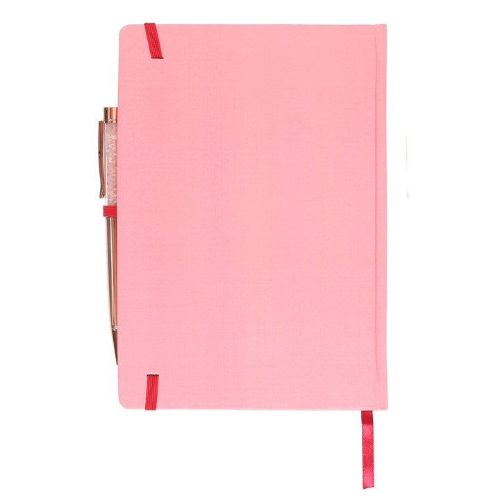 Pink notebook with red straps on a white background