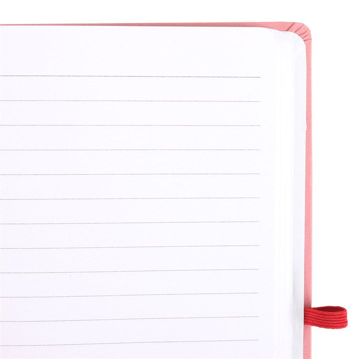 Notebook with red elastic band on a white background