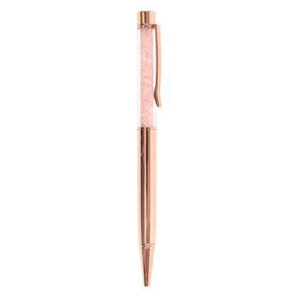 Rose gold pen on a white background