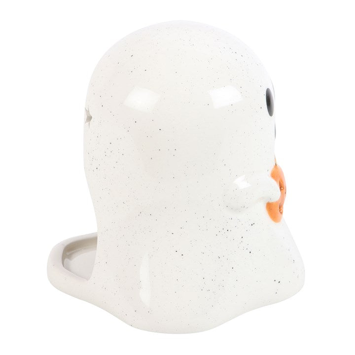White ceramic face-shaped container with orange accents on a white background