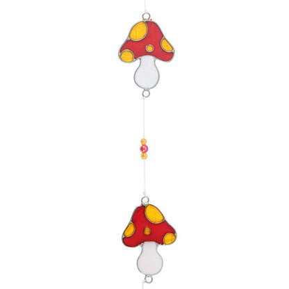 mushroom shaped suncatchers on a string of beads
