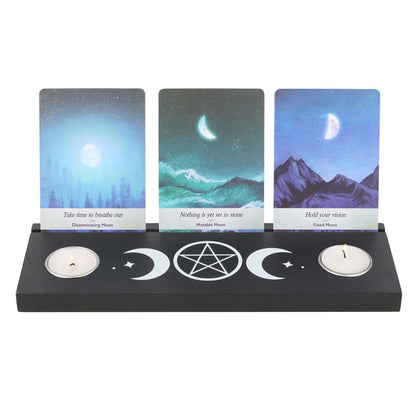 black wooden candle holder with triple moon design