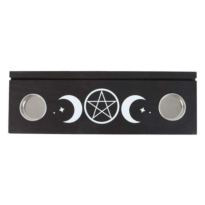 black wooden candle holder with triple moon design