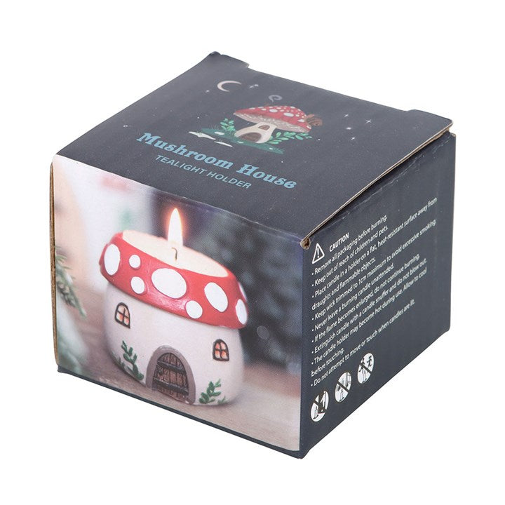 Mushroom-shaped tealight holder in packaging with text on a white background