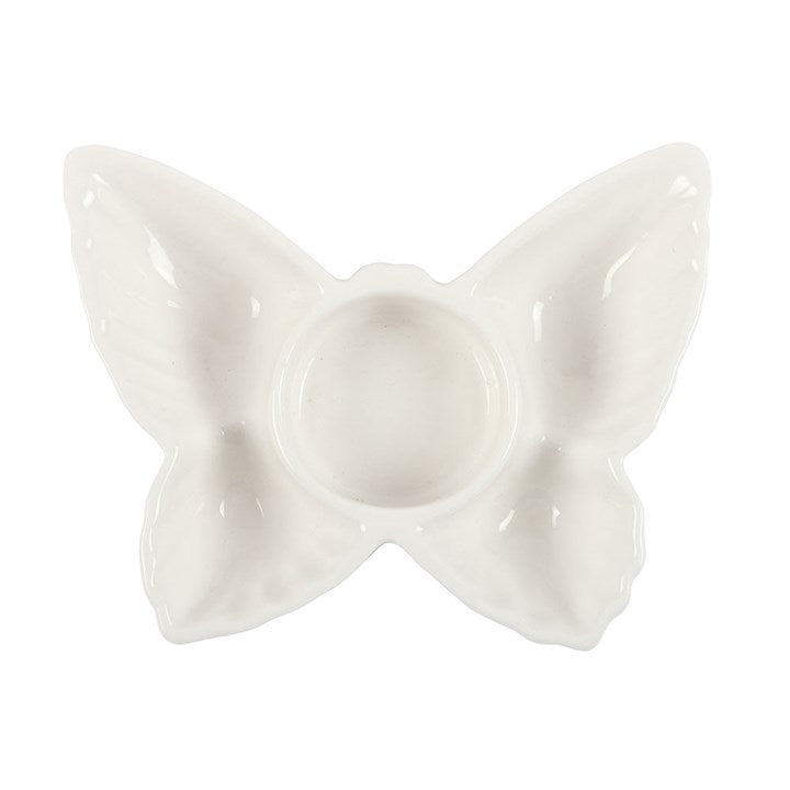 White ceramic butterfly on a white background