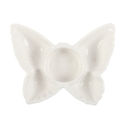 White ceramic butterfly on a white background