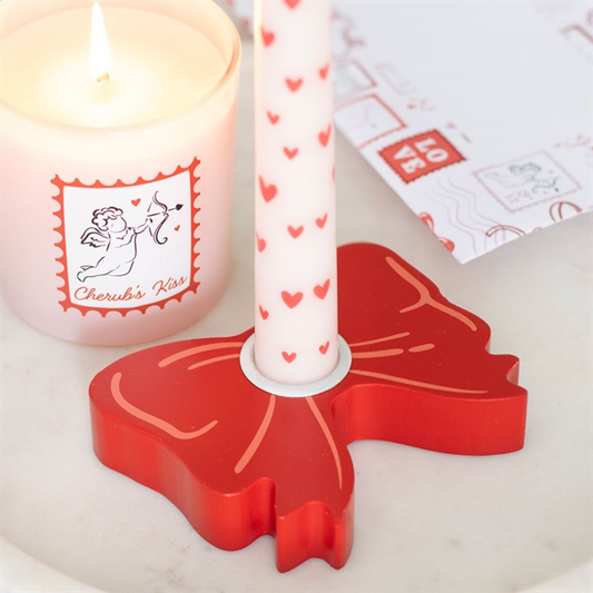 Red bow shaped taper candle holder
