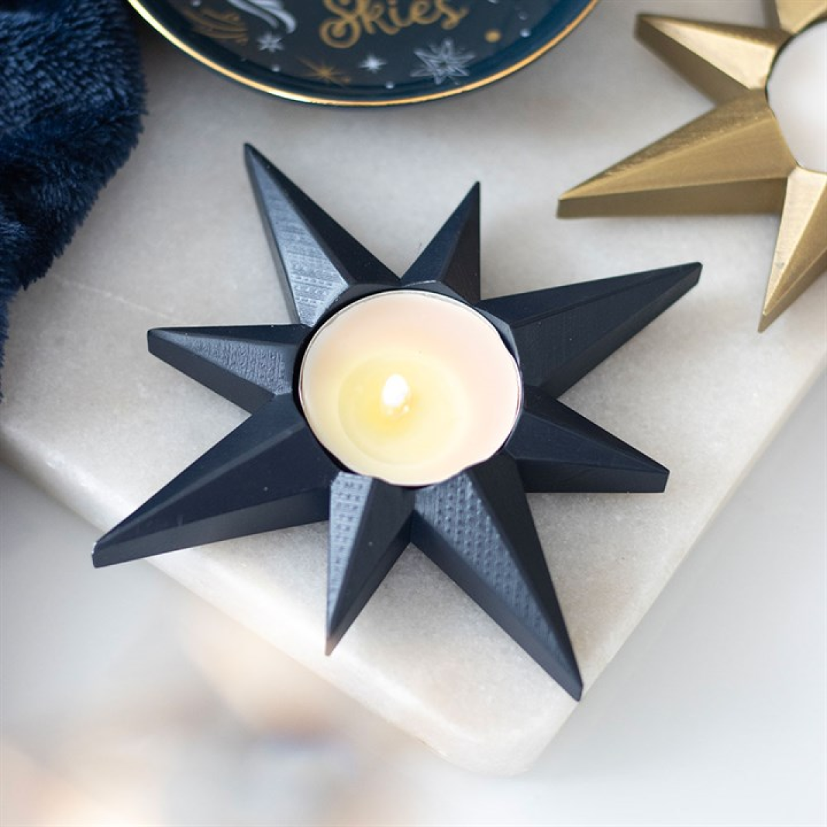 Navy blue star shaped tealight candle holder